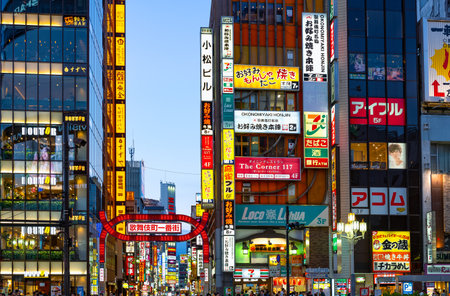 Tokyo, Japan  - June 8, 2017: Modern skyscrapers full of colorful illuminated signs in the Kabukicho district famous for the nightlifeのeditorial素材