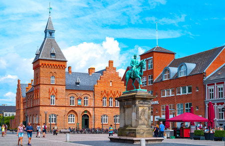 Esbjerg, Denmark - July 26, 2017:  Jutland peninsula,  ancient palaces and people walking in Torvet square with the equestrian statue of  Christian IXのeditorial素材