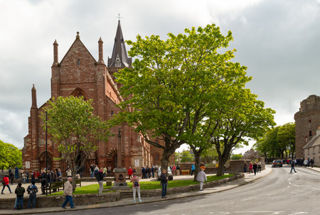 Kirkwall, Orkney, Scoland - June 4,  2019:  Tourists in the square  of the St.Magnus Presbyterian Cathedralのeditorial素材