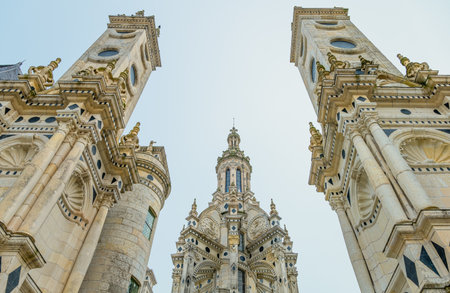 Chambord, France - November 14, 2018: Detail of the towers and spiers of the Chambord castle