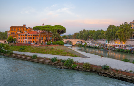 Rome, Italy - July 21,2018:  The  Tiber river and the Tiberina island at sunset seen from the Trastevere quarterのeditorial素材