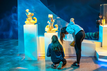 Athens, Greece - March 16, 2018:  Young female students in a  installation of tthe National Archaeological Museumのeditorial素材