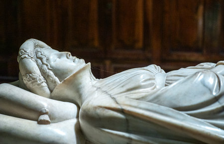 Lucca, Italy - June 5, 2018: Detail of the Gothic tomb and monument of Ilaria del Carretto by Jacopo della Quercia in the San Martino Cathedralのeditorial素材
