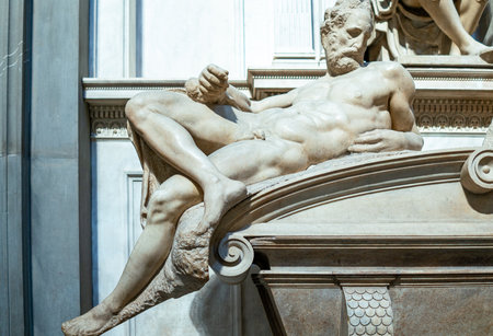 Florence, Italy - February 14, 2019: Medici chapels, the tomb of the Duke of Urbino, by Michelangelo, detail of the reclined statue represemting the Downのeditorial素材
