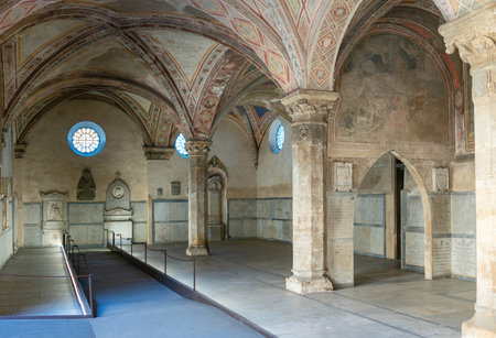 Florence, Italy - February 13, 2019: Basilica of Santa Maria Novella, The cloister of the Deadのeditorial素材
