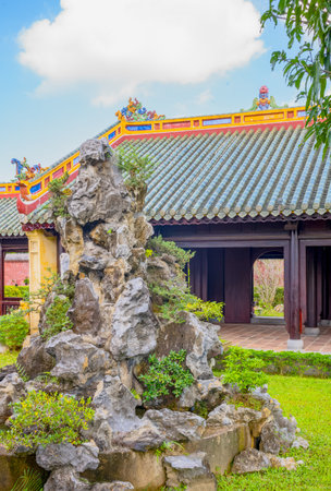Hue, Vietnam - November 22, 2019: Imperial Citadel, a small garden of the Imperial Royal Palaceのeditorial素材