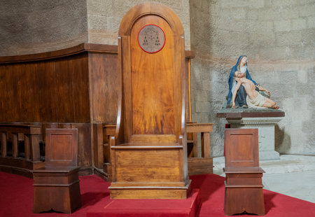 Viterbo, Italy - October 1, 2021: Detail of the bishop's seat and a sacred sculpture in the apse of the cathedral of San Lorenzoのeditorial素材