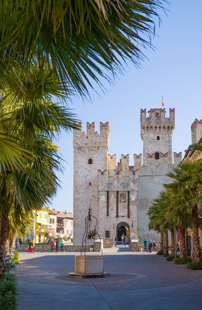 Sirmione, Italy - March 9, 2022: The main gate of the Scaliger Castle seen from the old townのeditorial素材