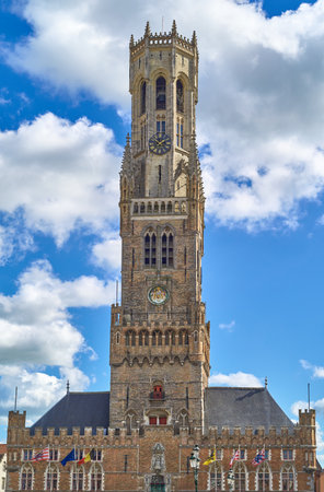 Bruges, Belgium, upward view of the main facade and bell tower of the Church of Our Ladyの写真素材