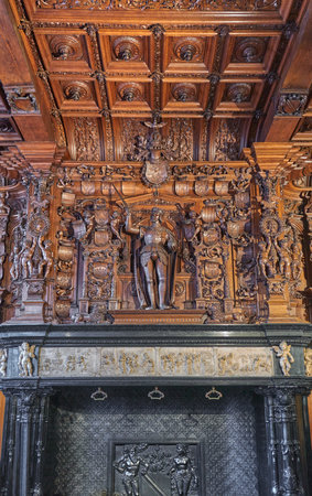 Bruges, Belgium - July 19, 2020: Wooden sculpture of the Emperor family in the Alderman Hall, of the Justice palaceのeditorial素材