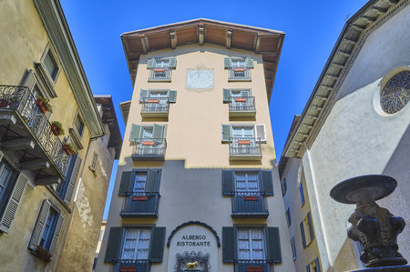 Brergamo, Italy - March 7, 2017: A vertical hotel with sundial in the old cityのeditorial素材