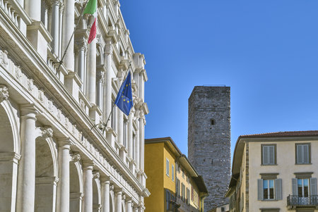 Italy, Bergamo, view of the facade of the Civic Lybrary (left) with the Gombito's tower (Torre del Gombito) in the background.のeditorial素材