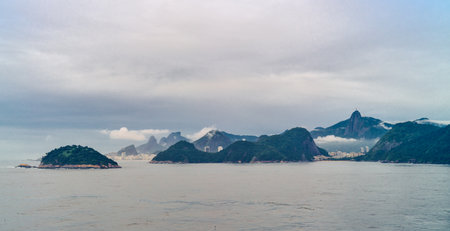 Brazil, Rio De Janeiro, panorama of the famous bay of Rio seen from the sea at the first light of...