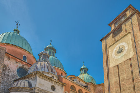 Treviso, Italy, upward view of the domes and the bell tower of the cathedral of St. Peterの写真素材