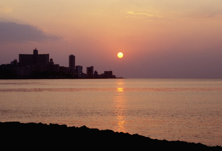 Havana, Cuba, sunset on the waterfront of Maceo Avenue, also known as MalecÃ³nの写真素材