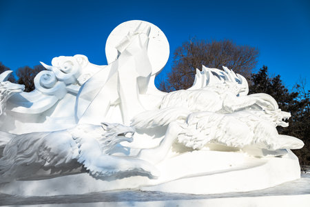 Harbin, China - January 2015: Snow sculpture of wolves in the 27th China Harbin Sun Island International Snow Sculpture Art Expo. Located in Harbin City, Heilongjiang, China.のeditorial素材