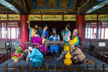 Yantai, China - June 2015 - Penglai Pavilion near Yantai, Shandong, China. Statues representing the legend of the eight immortals cross the sea Thatのeditorial素材