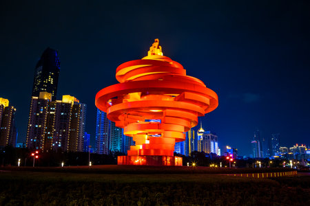Qingdao, China, 09/22/2015. May 4th square (Wu Si Guangchang) is a popular tourist attraction in Qingdao and is beautifully lighted at night.のeditorial素材