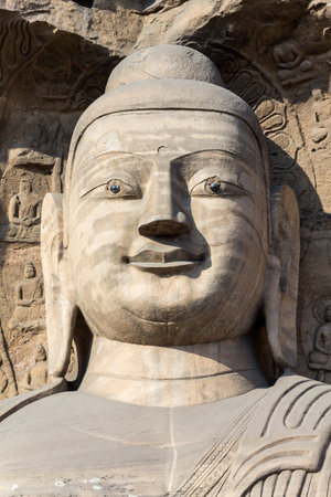Buddha statue at Yungang grottoes in Datong, Shanxi Province, Chinaの写真素材