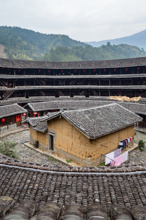 Jiqing Lou in ChuXi Cluster - Fujian province, China. The tulou are ancient earth dwellings of the Hakka peopleのeditorial素材