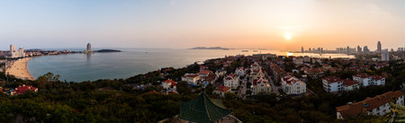 Panorama from the hill of Xiaoyushan park at sunset, Qingdao, Shandong, Chinaの写真素材