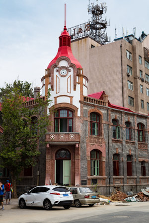 June 2015 - Yantai, China - German style buildings around of Yantai Shan, the hill in the old town with a lighthouse, a temple and the smoke signal terrace that gives the name to the cityのeditorial素材