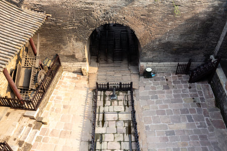 One of the fortified entry gates of the ancient walls protecting the Old city of Pingyao, Shanxi province, China.の写真素材