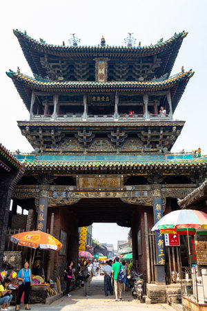 Aug 2013 - Pingyao, Shanxi, China - The ancient tower in the South Street of Pingyao, one of the main roads of the old city. Pingyao is a UNESCO world Heritage siteのeditorial素材