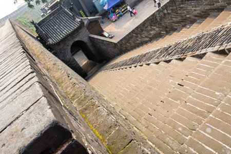 Aug 2013 - Pingyao, China - Entry staircase of the ancient walls protecting the Old city of Pingyao. Pingyao is a UNESCO World Heritage Siteのeditorial素材