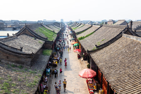 Aug 2013 - Pingyao, Shanxi, China - View from the tower of the South Street of Pingyao, one of the main roads of the old city. Pingyao is a UNESCO world Heritage siteのeditorial素材