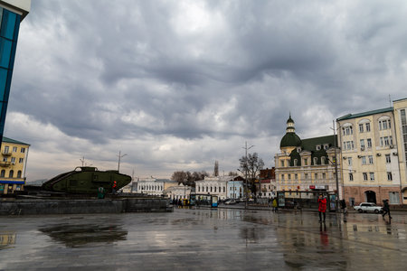 Dec 2017, Kharkiv, Ukraine: tourists near a British tank outside of the History Museum at Constitution Square, one of the most beautiful in the historic city centerのeditorial素材