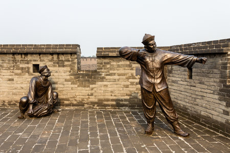 Aug 2013 - Pingyao, China - Decorative statues on the ancient walls protecting the Old city of Pingyao, the most preserved of China. Pingyao is a UNESCO World Heritage Siteのeditorial素材