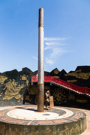 Aug 2017, Flaming Mountains, Xinjiang, China: giant thermometer and monkey king statue at the flaming mountains site in the Turpan basin. Max recorded temperature here has been 66.8 degreesのeditorial素材