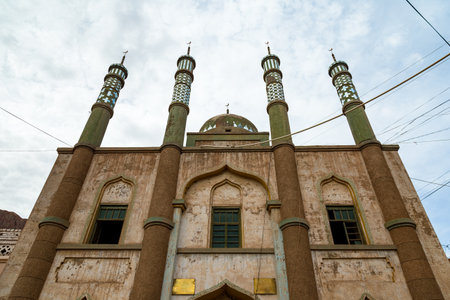 Tuyoq village (Tuyuk): the mosque of this traditional uighur village set in a lush valley cutting through the flaming mountains near Turpan, Xinjiang, China.の写真素材