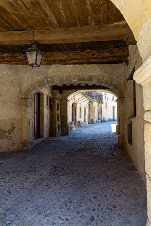 may 2019, Pedraza, Castilla Y Leon, Spain: covered alley behind Plaza Mayor. Pedraza is one of the...