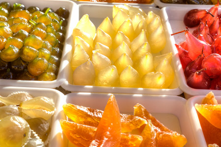 candied fruit, pears, grapes, melons, cherries, figsの写真素材
