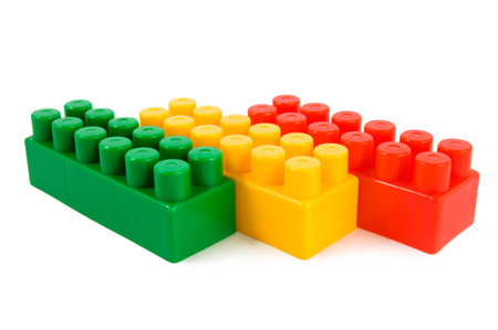 Stack of colourful building blocks isolated on a white backgroundの写真素材