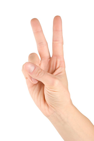 Hand simulating victory sign isolated on a white backgroundの写真素材