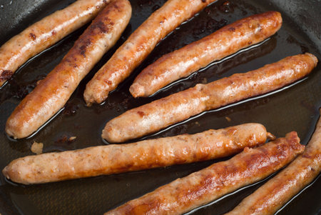 Pork sausage in a skillet with nonstickの写真素材