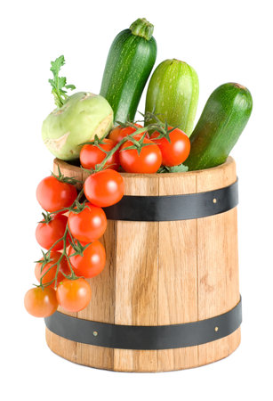 Wooden barrel with vegetablesの写真素材