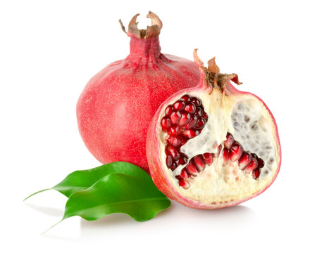 Pomegranate with leavesの写真素材