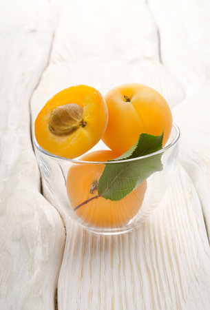 Apricots in a cupの写真素材