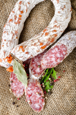 Salami sausage on a canvasの写真素材