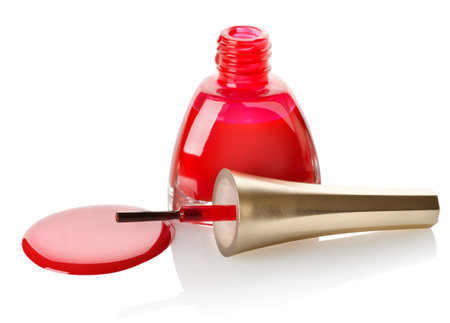 Red nail polish and brushの写真素材