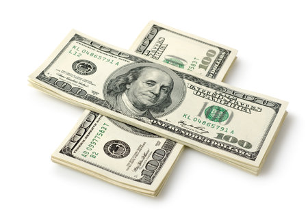 Money in the form of a crossの写真素材