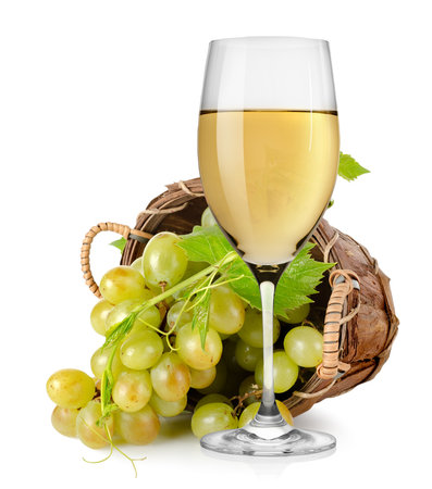 White wine and  grapes in a basketの写真素材