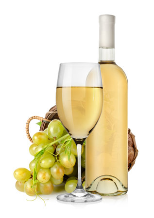White wine bottle and grapes in basketの写真素材