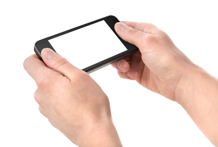 Smart phone in hand isolatedの写真素材