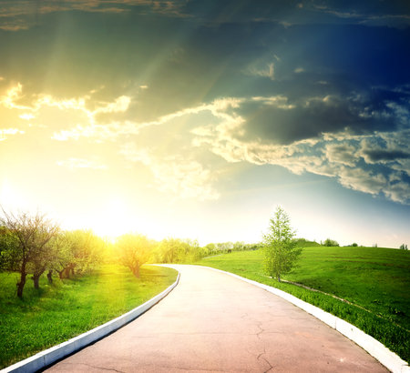 Asphalted road to the sunの写真素材