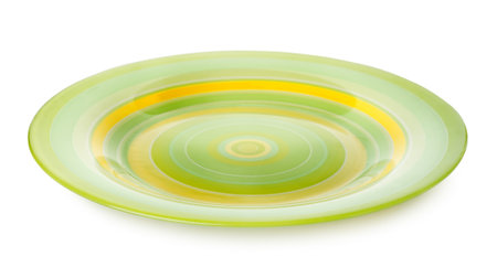 Green plate isolated on a white backgroundの写真素材